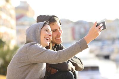 teeth whitening lake oswego | couple taking selfie