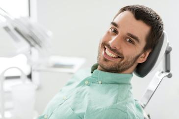 dental cleanings lake oswego | man at dentist