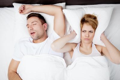 sleep apnea treatment lake oswego | person snoring and partner is awake