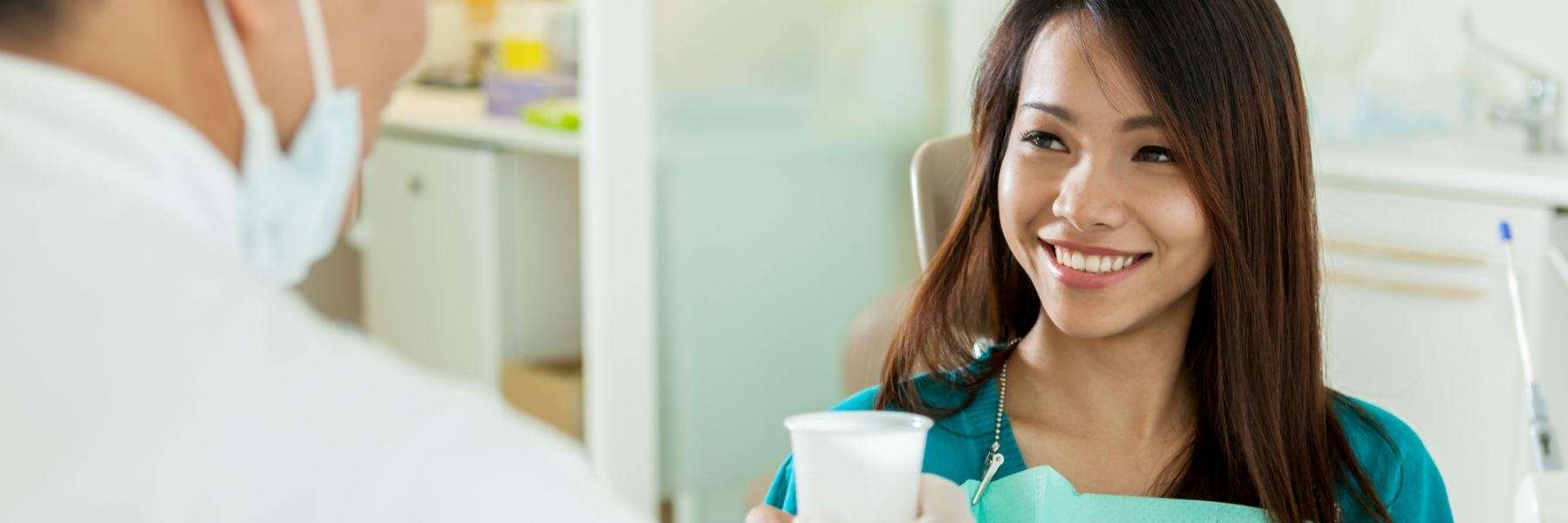 patient at consultation with holistic implant dentist