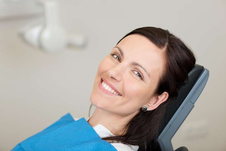 holistic dentist lake oswego | woman at dentist
